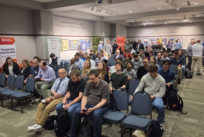 Audience filling the MOCS main hall before the keynote